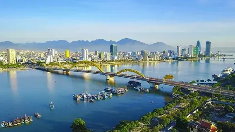 Da Nang city skyline and the dragon bridge over the river